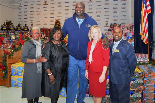 Working with Fairview Elementary in surprising all student with a Christmas from Shaq