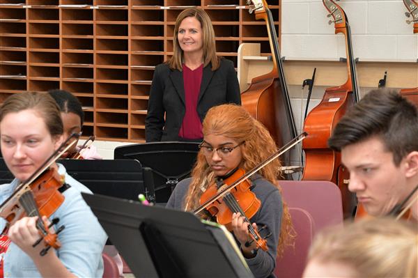 Enjoying the musical talents of UGHS's orchestra 